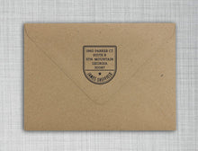 James Personalized Self-inking Round Return Address Stamp on Envelope