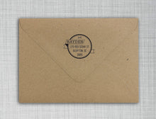 Hayden Personalized Self-inking Round Return Address Stamp on Envelope